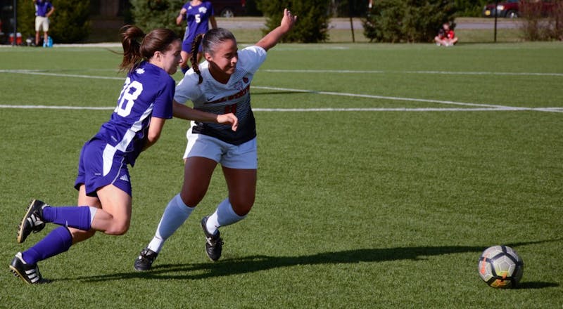 Junior midfielder Paula Guerrero fights for ball on Sept. 15 during the Cardinals' game against Western Illinois in  Briner Sports Complex. Ball State won with one point during the first half and two points during the second. Harrison Raft, DN File