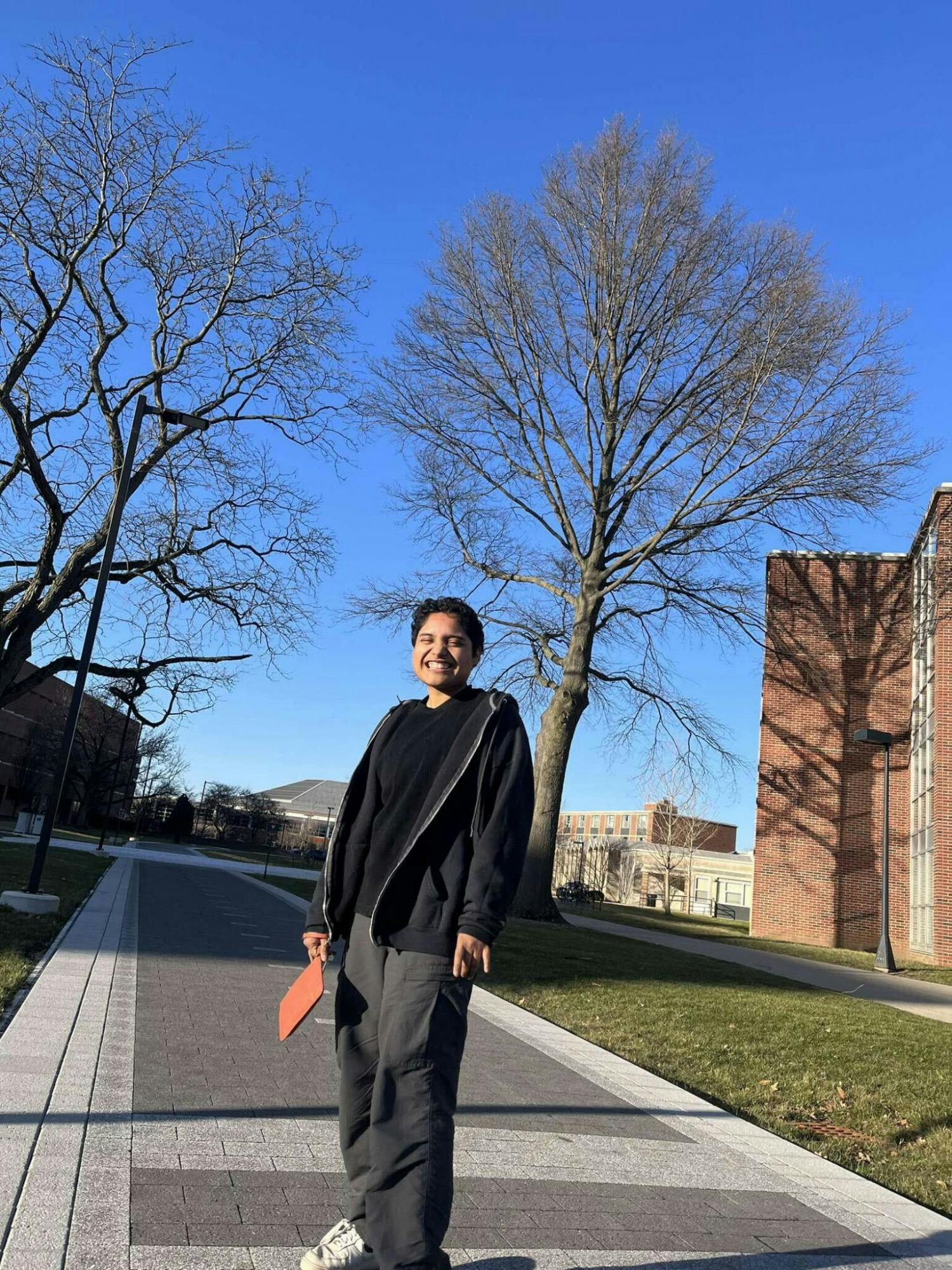 Fourth-year biology major Sherlyn Contreras skates between Noyer and Woodworth complexes Feb. 20 in Muncie, Ind. Sherlyn Contreras, Photo Provided