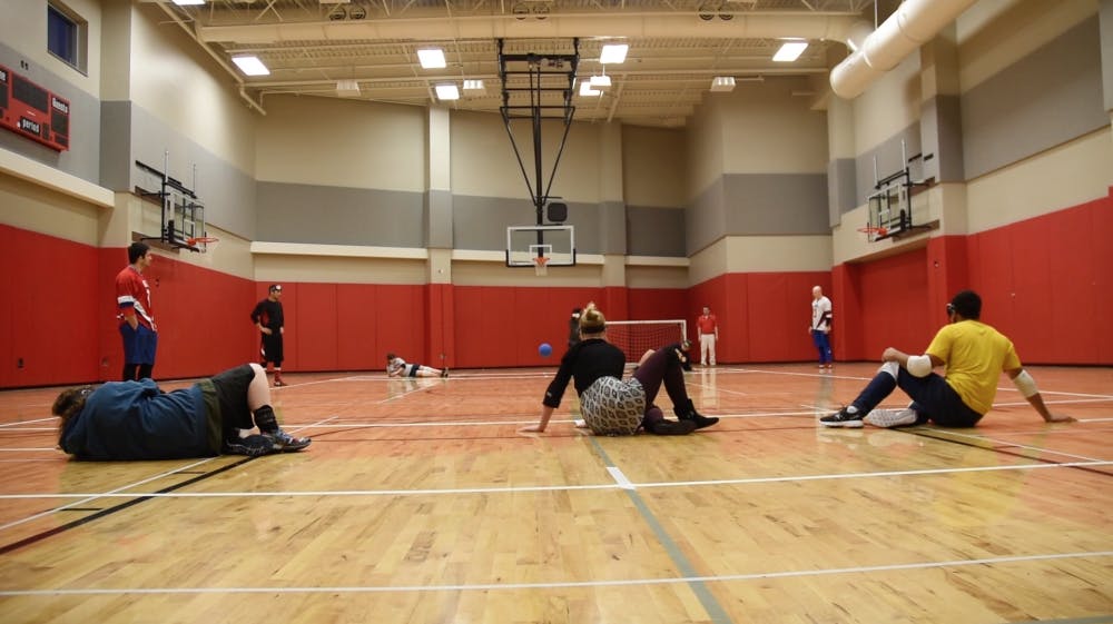 Ball State students try out goalball after olympic athletes teach them how to play on March 22.&nbsp;&nbsp;DN PHOTO PATRICK CALVERT