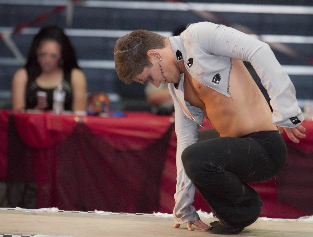 Apollo Summers strikes a pose in the middle of his performance. DN PHOTO JONATHAN MIKSANEK