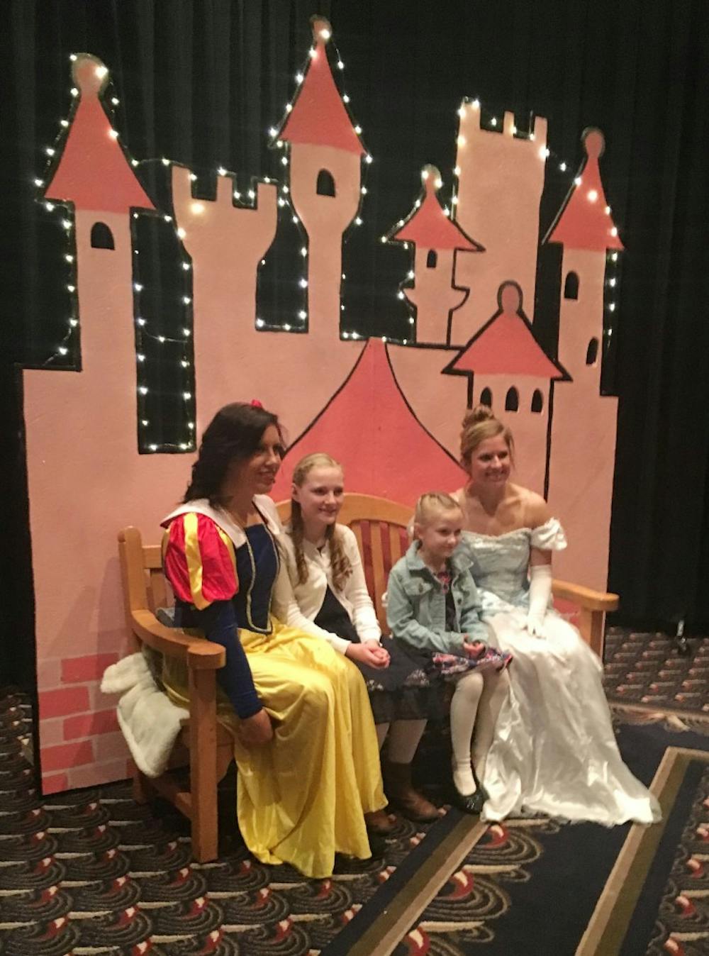<p>Gymnasts Jackie Duffy and Baylee Bell pose as princesses at the Royal Princess Ball on Feb. 10 in the Convention Center in Downtown Muncie. This was the gymnastics fifth annual ball. Michelle Kaufman // DN</p>