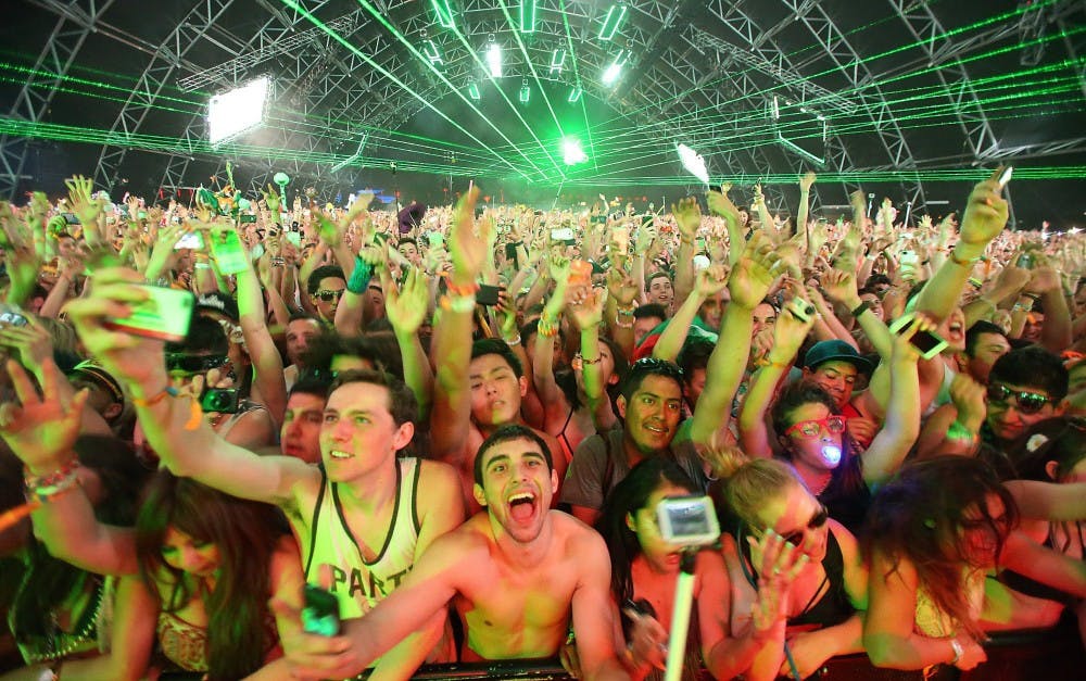 Fans of Martin Garrix watch the show during the opening night of Coachella on April 11 in Indio, Calif. MCT PHOTO