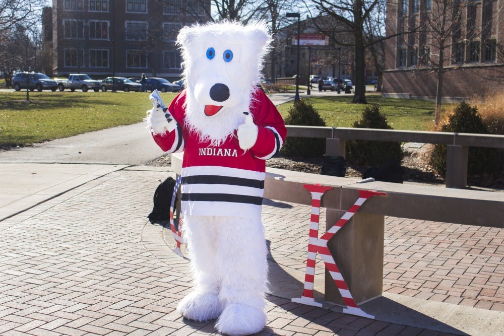 <p>A polar bear hands out information about Phi Sigma Kappa’s upcoming philanthropy, the Polar Plunge to benefit the Special Olympics on Jan. 26 at the scramble light. <strong>Briana Hale, DN</strong></p>