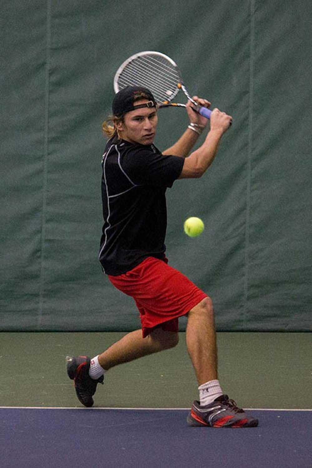 Imanol Arconada anticipates the ball during a tennis match Feb. 20 at Muncie YMCA. Ball State played two games yesterday against IPFW and Indiana Tech. DN PHOTO TAYLOR IRBY