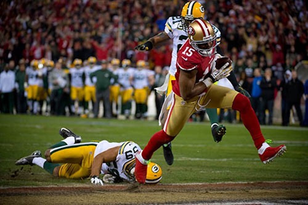 San Francisco 49ers wide receiver Michael Crabtree scores an 18-yard touchdown in the second quarter of the NFC Divisional Playoff in January. Crabtree is receiving medical attention after a potential tear of his Achilles tendon. MCT PHOTO 