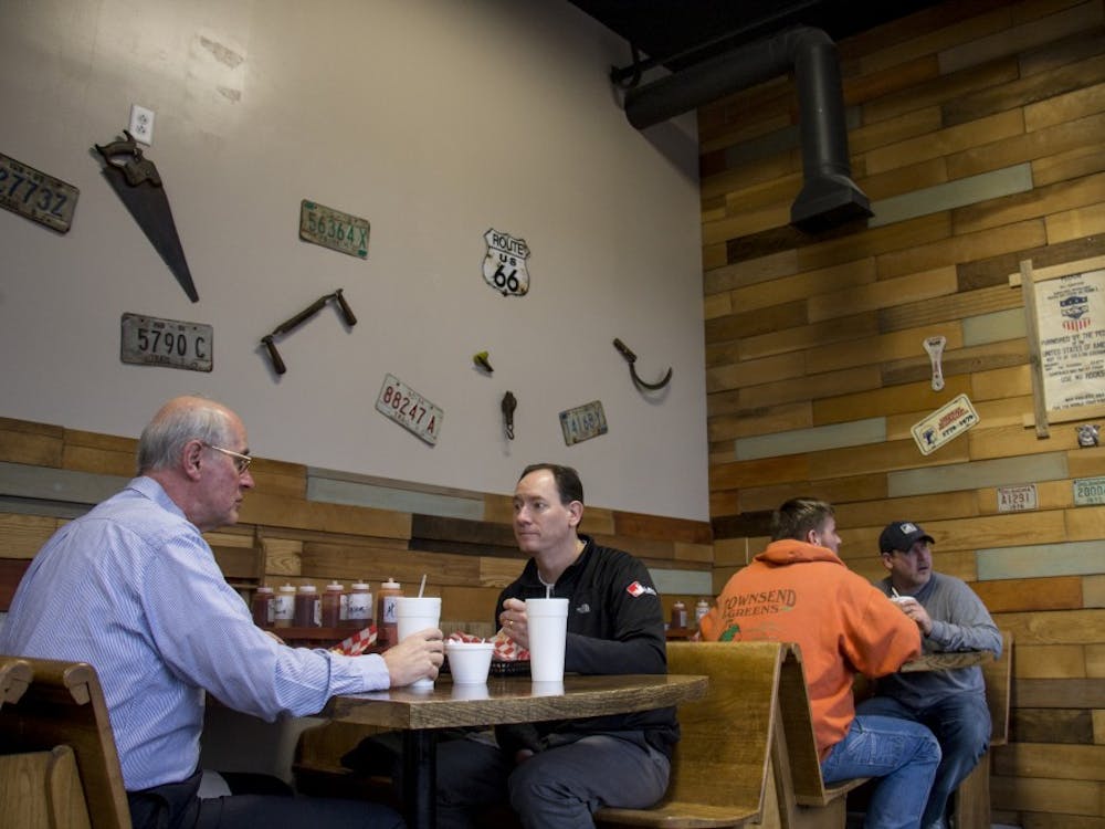 Guests eat at MT's Smokin' BBQ Feb. 15. Travis and Mandy Thorrington started this business as a food truck and now customers can enjoy their meals inside the new restaurant. Eric Pritchett, DN