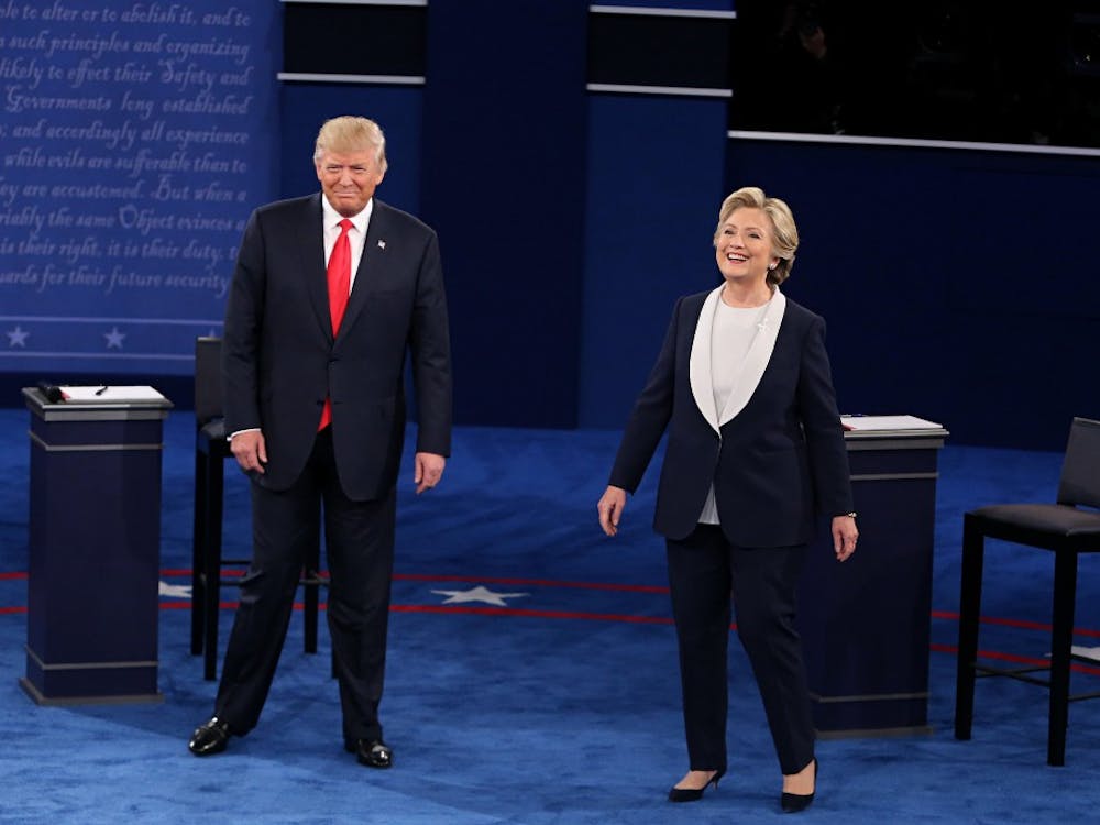 Donald Trump and Hillary Clinton take the stage at the start of the second debate between the Republican and Democratic presidential candidates on Sunday, Oct. 9, 2016 at Washington University in St. Louis, Mo. (Christian Gooden/St. Louis Post-Dispatch/TNS)