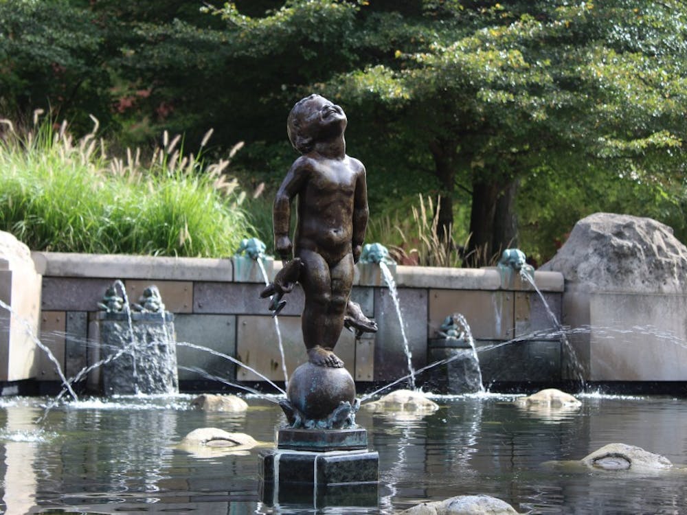 Frog Baby stands in the fountain Thursday, Aug. 30, 2018, outside of Bracken Library. Brooke Kemp, DN