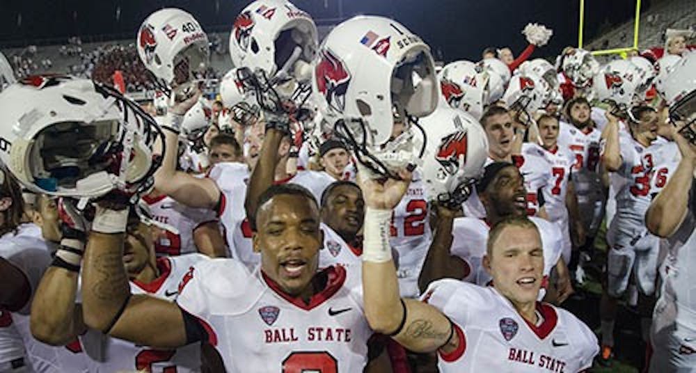 The Ball State football team sings the fight song after a win against Illinois State on August 29. Ball State swept Illinois State 51 - 21. DN PHOTO COREY OHLENAKMP