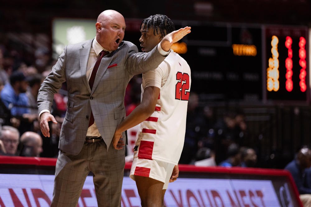 Head coach Michael Lewis teaches Freshman TJ Burch about a play against Detroit Mercy on Nov 20 at Worthen Arena. Ball state lost 59-70. Titus Slaughter, DN.