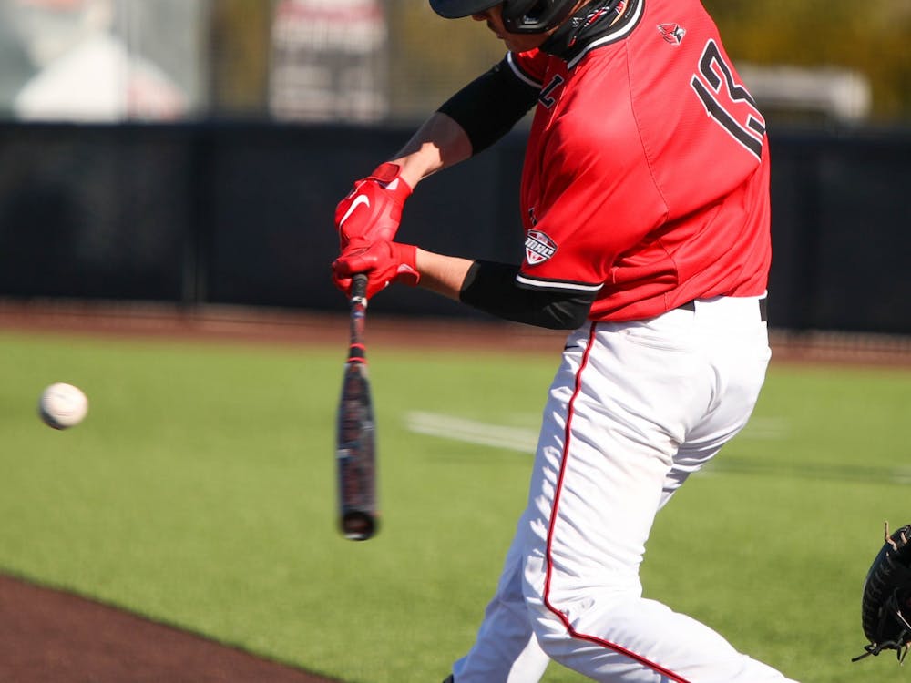 Junior first baseman Trenton Quartermaine hits the ball March 20, 2021, at First Merchants Ballpark. The Cardinals won their second game of the day 3-2 against Western Michigan. Jaden Whiteman, DN