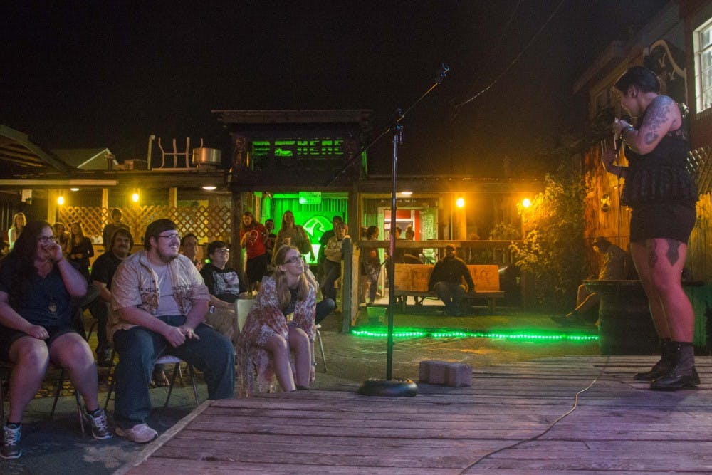 Tennah McDonald of New Castle, Ind., performs at Comedy Underground at Be Here Now on Wednesday night. McDonald is an organizer of the event. DN PHOTO TAYLOR IRBY
