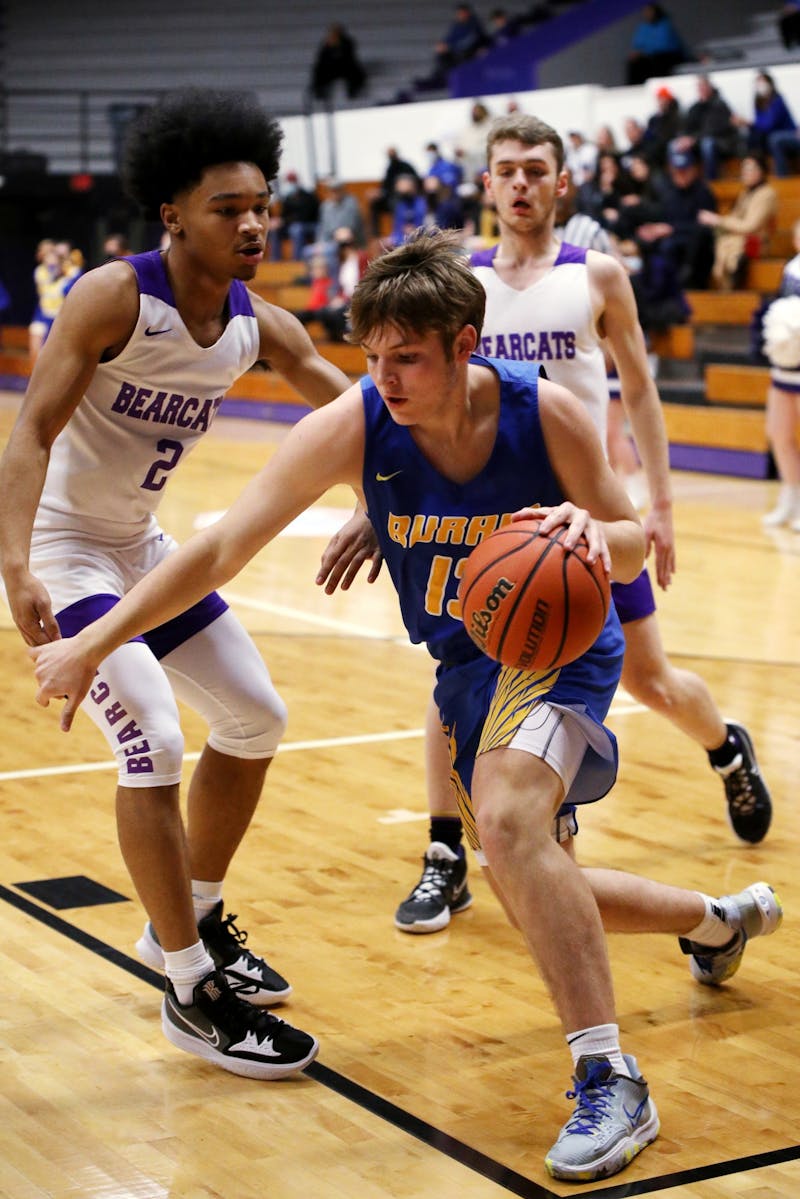 Connor McKibben (13) dribbles the ball towards the basket against Muncie Central Bearcats at the Inaugural City of Champion Basketball Invitational on Jan. 29, 2022, at Muncie Fieldhouse in Muncie, IN. Amber Pietz, DN