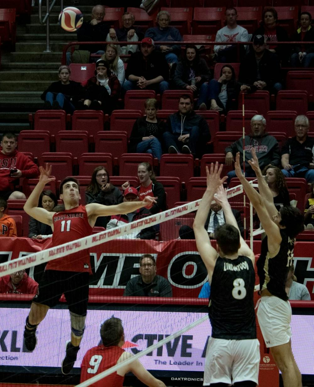 <p>Senior Mitch Weiler spikes the ball over the net during the game against Lindenwood University on March 30 at John E. Worthen Arena. Weiler had one ace during the game. <strong>Rebecca Slezak, DN</strong></p>