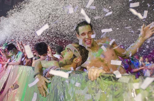 Two students take in the finale of the Life in Color concert. The event took place Nov. 10 in Worthen Arena. DN FILE PHOTO COREY OHLENKAMP