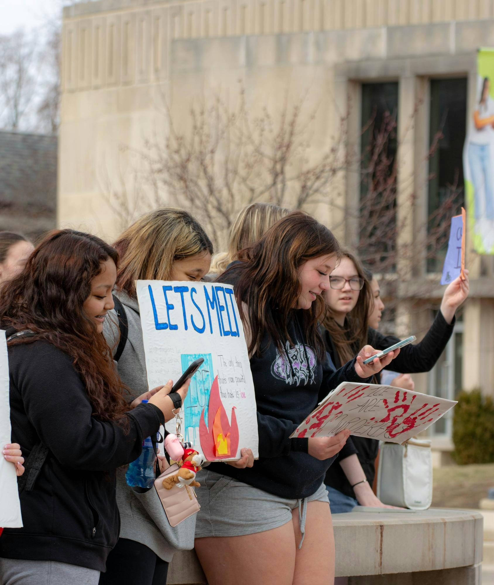 Some students took time from the chanting to scroll on their phones. Feb. 17 Ball State University. Aiden Murray, NLI.