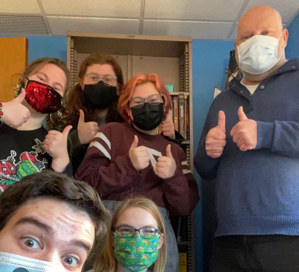 Troy Dobosiewicz (far right) poses for a picture with students Kayla Howard, Andrew Watkins, Lillia Nugent (top row), Sam Ruby and Alyssa Taylor (bottom row). Sam Ruby, Photo Provided