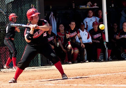 Then sophomore Audrey Bickel eyes the pitch from Akron on April 7, 2012. Bickel has scored 4 home runs this season. DN FILE PHOTO JONATHAN MIKSANEK