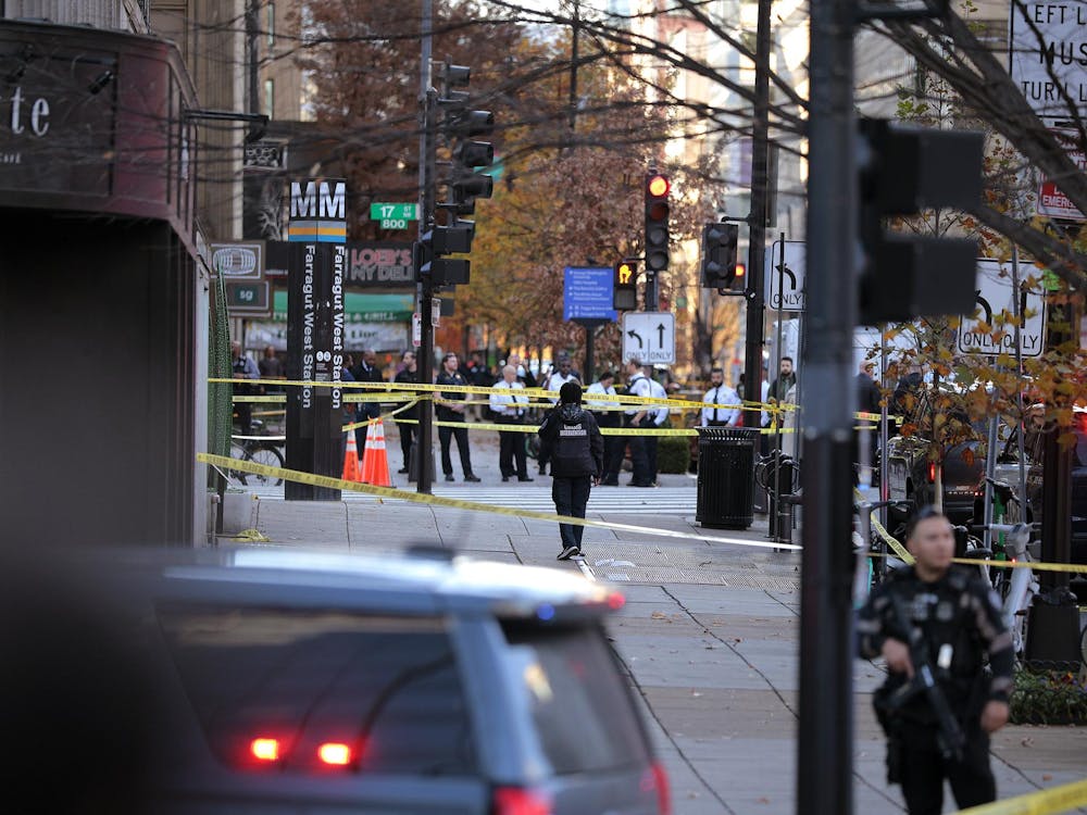 WASHINGTON, DC - NOVEMBER 26: Members of law enforcement, including the U.S. Secret Service and the Washington Metropolitan Police Department, respond to a shooting near the White House on November 26, 2025 in Washington, DC. Two West Virginia National Guard members were shot and killed blocks from the White House. (Photo by Chip Somodevilla/Getty Images)