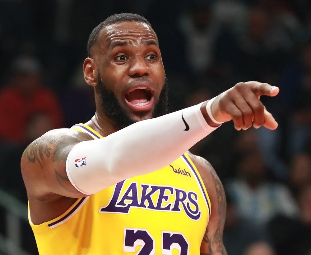 The Los Angeles Lakers' LeBron James directs his team against the Atlanta Hawks on Feb. 12, 2019, at Philips Arena in Atlanta. (Curtis Compton/Atlanta Journal-Constitution/TNS)
