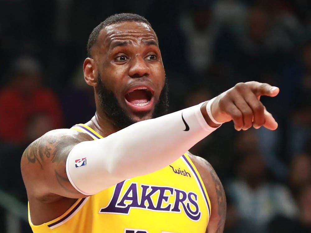The Los Angeles Lakers' LeBron James directs his team against the Atlanta Hawks on Feb. 12, 2019, at Philips Arena in Atlanta. (Curtis Compton/Atlanta Journal-Constitution/TNS)