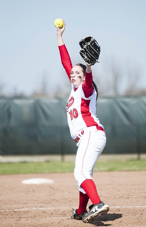 Freshman Kelsey Schifferdecker pitches the ball against Northern Illinois. DN PHOTO JONATHAN MIKSANEK