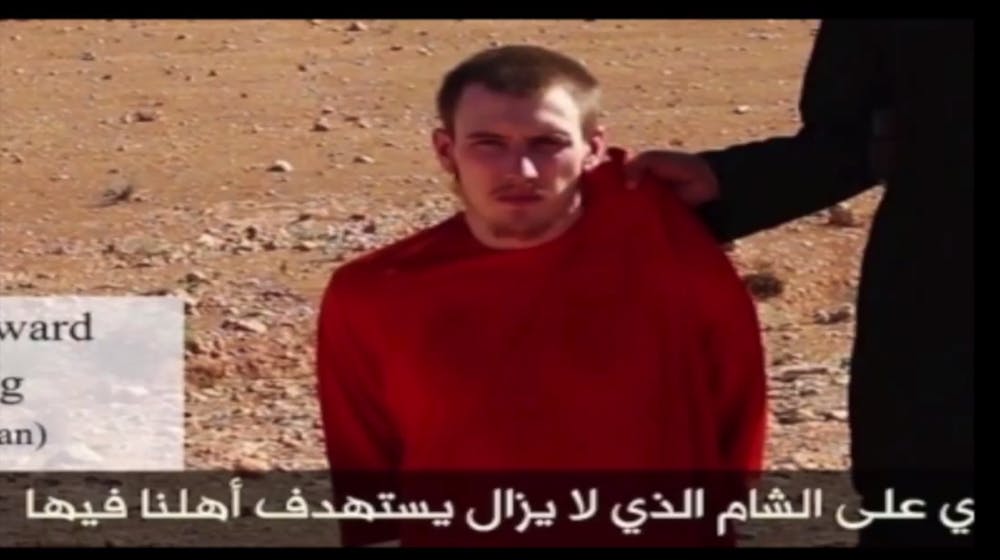 <p>Peter Kassig was captured last year while delivering relief supplies to refugees of Syria's civil war. The White House confirmed Kassig's death Sunday after Islamic State militants released a video showing Kassig had been beheaded. PHOTO COURTESY OF YOUTUBE</p>