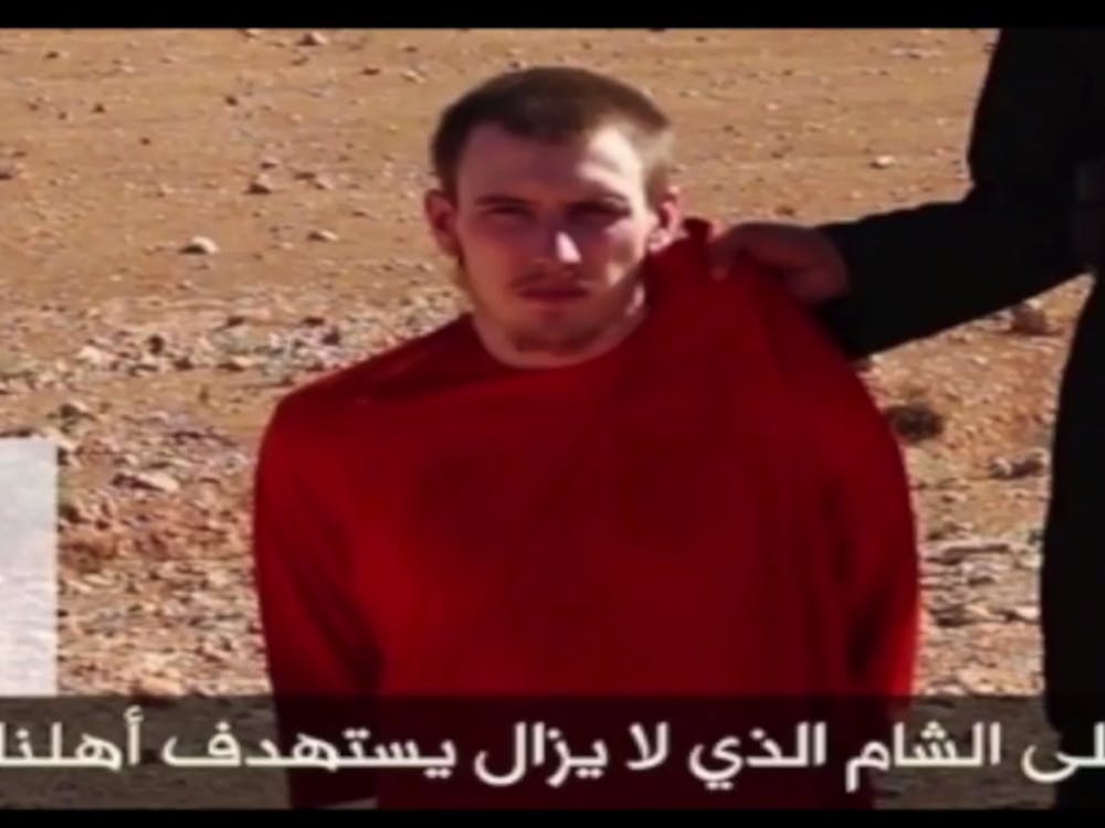 Peter Kassig was captured last year while delivering relief supplies to refugees of Syria's civil war. The White House confirmed Kassig's death Sunday after Islamic State militants released a video showing Kassig had been beheaded. PHOTO COURTESY OF YOUTUBE