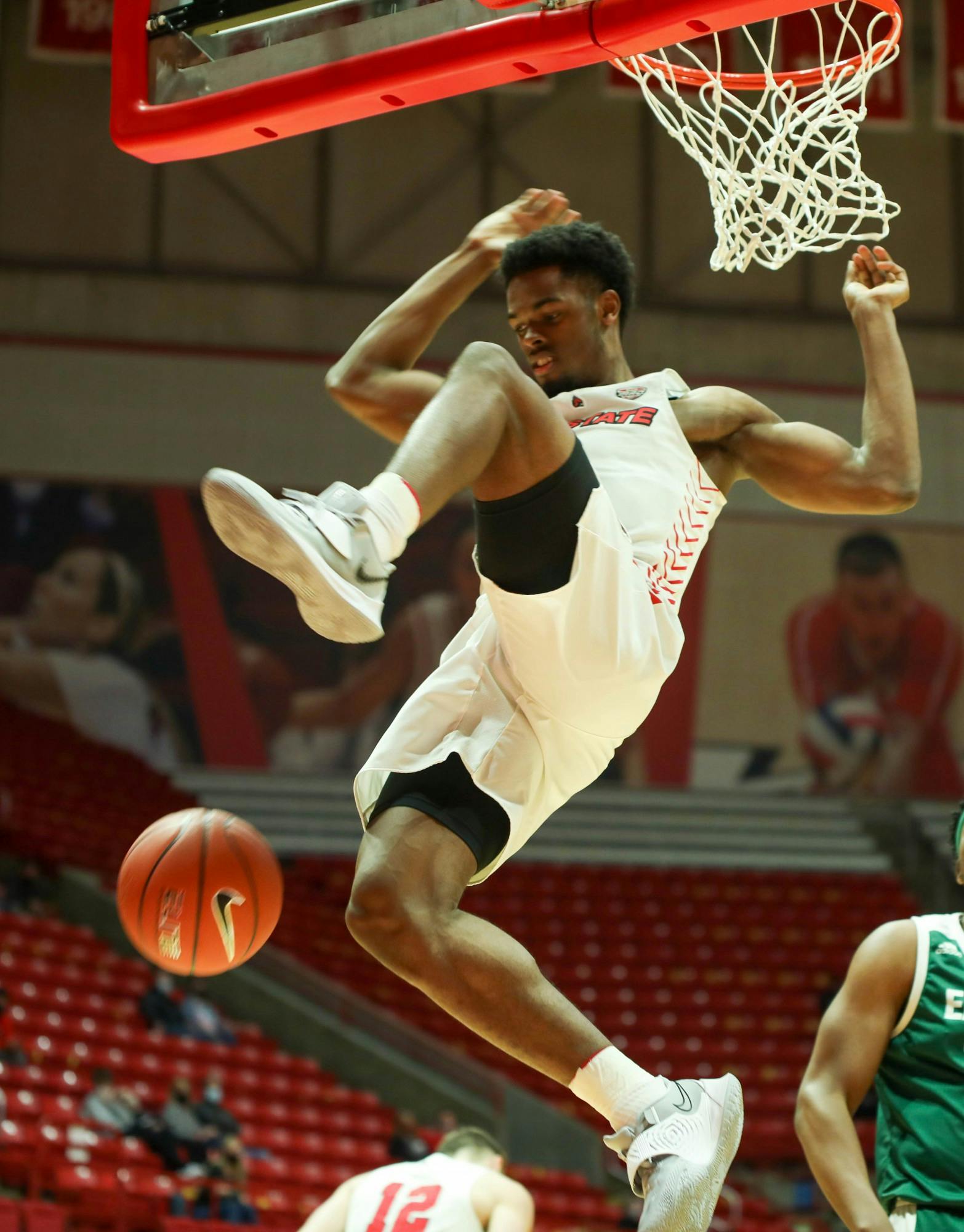 Redshirt fifth year guard K.J. Walton dunks the ball March 2, 2021, in John E. Worthen Arena.  Ball State beat the Eastern Michigan Eagles 100-65. Jaden Whiteman, DN