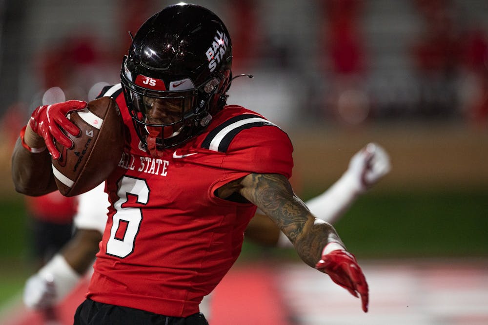 Ball State junior wide receiver Yo'Heinz Tyler caches a pass in the end one for a touchdown Nov. 18, 2020, at Scheumann Stadium. Tyler caught the ball for 108 yards. Jacob Musselman, DN