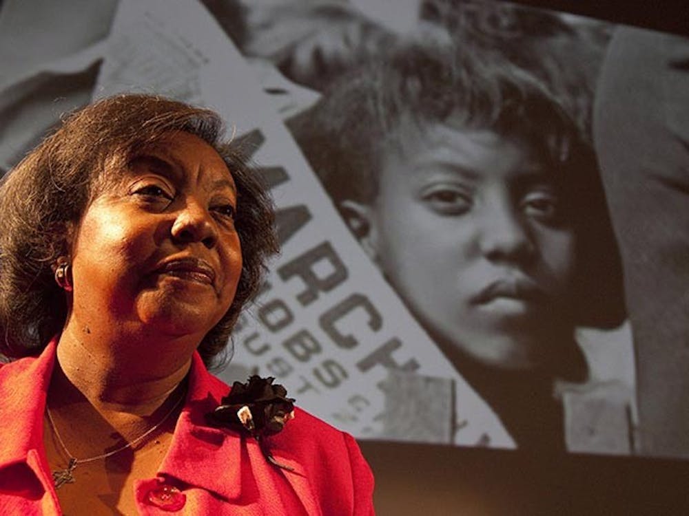 Edith Lee Payne stands in front of an image of herself at the age of 12 taken at the March on Washington after participating in a Black History Month program at the Detroit School of the Arts, February 15, 2012. (Kathleen Galligan/Detroit Free Press/MCT)