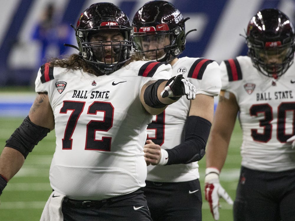 Ball State Cardinals redshirt senior offensive lineman Anthony Todd points at a University at Buffalo defensive lineman Dec. 18, 2020, at Ford Field in Detroit, Mich. The Cardinals beat the University at Buffalo Bulls 38-28. Jacob Musselman, DN 