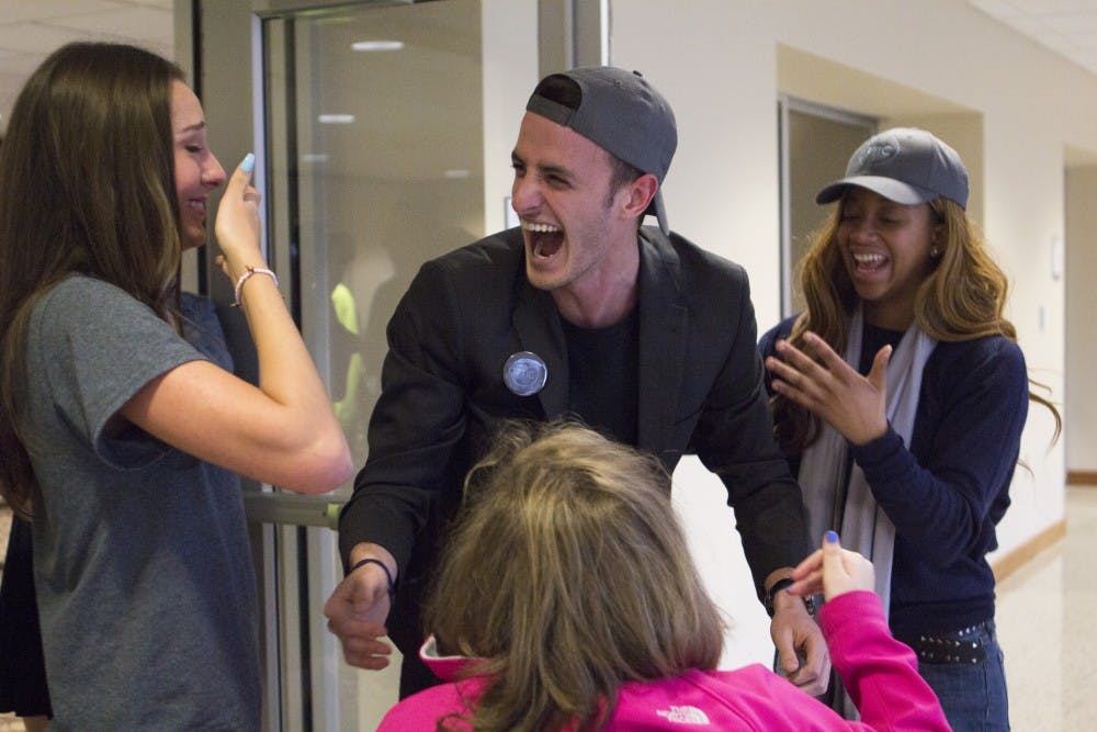 The OPTiC slate reacts after winning the SGA election on Feb 28. Emma Rogers // DN