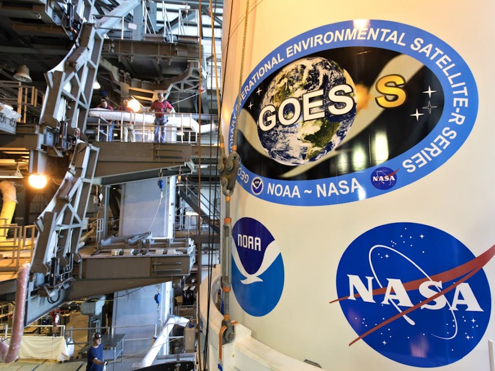 The payload fairing containing NOAA's Geostationary Operational Environmental Satellite-S (GOES-S) was lifted up by crane and moved into the United Launch Alliance (ULA) Vertical Integration Facility at Cape Canaveral Air Force Station in Florida. The satellite is slated to launch aboard the ULA Atlas V March 1. NASA/Glenn Benson, Photo Provided