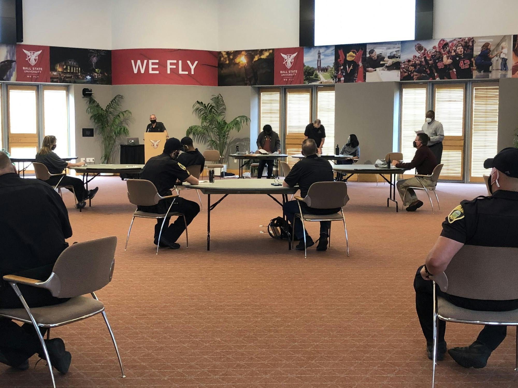 Larry Gerstein, director of the Center for Peace and Conflict Studies, speaks at the podium Sept. 17, 2020 at the Alumni Center for University Police Department&#x27;s (UPD) de-escalation training. Director of public safety Jim Duckham said UPD has completed two de-escalation trainings with the Center for Peace and Conflict Studies since 2015. Jim Duckham, Photo Provided