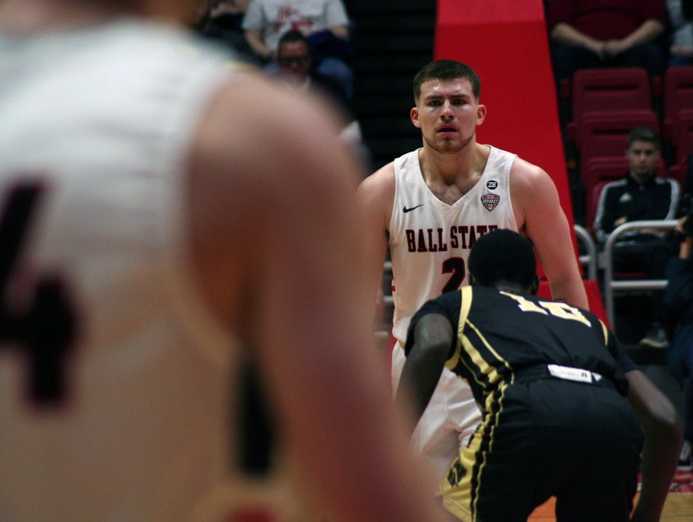 <p>Junior Tayler Persons looks to pass while playing against Western Michigan at John E. Worthen Feb. 23. The Cardinals fell 80-87. <strong>Jack Hart, DN</strong></p>