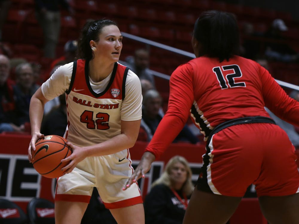 Senior Annie Rauch looks to pass the ball to a teammate in an exhibition game against Wheeling University Nov. 1 at Worthen Arena. Amber Pietz, DN