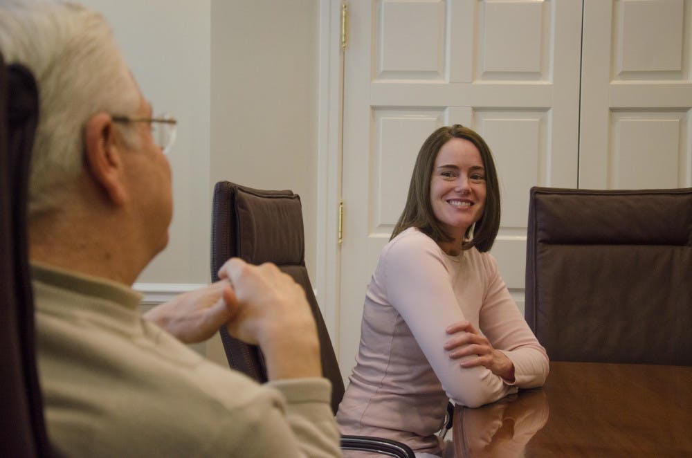 <p><strong>Julie Hopwood</strong> talks with President Paul Ferguson about her transition into being the chief of staff, a position that hasn't been around for 10 years. She has worked with Ferguson for 12 years at four different institutions. <em>DN PHOTO BREANNA DAUGHERTY </em></p>