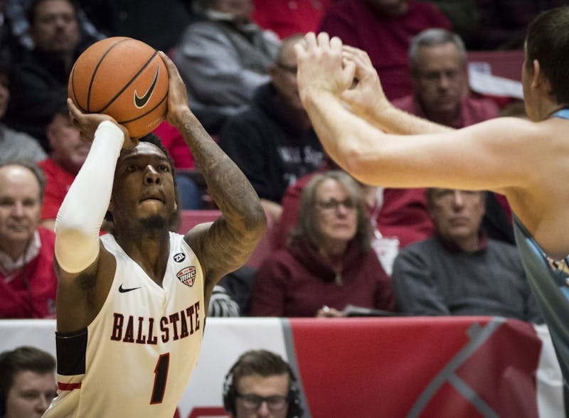 Junior guard, Jontrell Walker, searches for a 3-point shot in the first half against Oakland City Nov. 28 at John E. Worthen Arena. Ball State plays Notre Dame Dec. 5 in South Bend. Grace Hollars, DN File