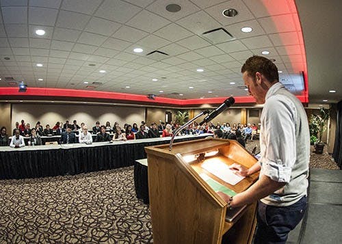 Newly sworn-in president Malachi Randolph addresses the Student Government Association after being sworn in on April 17. SGA swore in their new executive board as well as off-campus representatives and senate members. DN PHOTO JONATHAN MIKSANEK