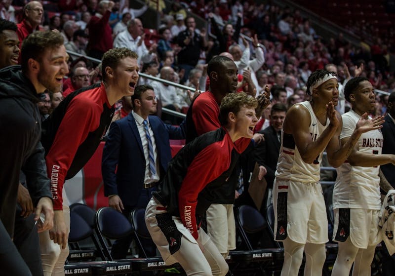 The Cardinals cheer for their team at the home game in John E. Worthen Arena Feb. 23 against the Broncos. Ball State lost 80-87. Rebecca Slezak, DN