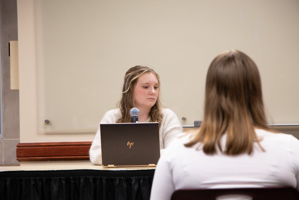 The moderator of the Student Government Association (SGA) presidential debate Brianna Morton sits in the L.A. Pittenger Student Center Feb. 14. Questions were provided by Morton and attendees of the debate. Elissa Maudlin, DN.