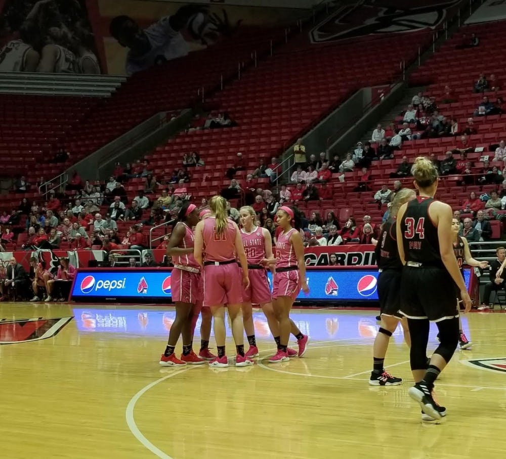 Ball State Women's basketball huddles up before a free throw attempt in a game against Northern Illinois on Feb. 9 at Worthen Arena. The Cardinals fell to the Huskies, 93-83. Daric Clemens, DN 