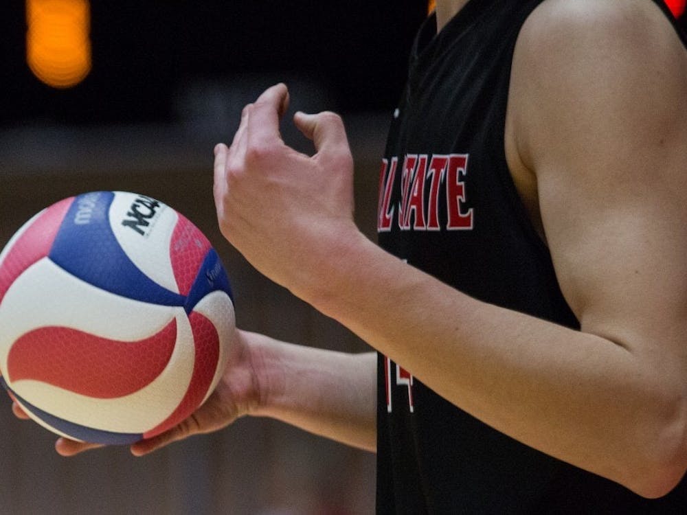 Sophomore Matt Szews gets ready to serve to Ohio State in the fifth set during the Cardinals' game against the Buckeyes on senior night in John E. Worthen Arena April 7. Eric Pritchett, DN