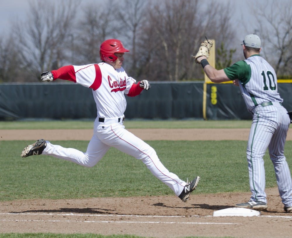 Freshman outfielder Alex Call runs to first base during the game against Eastern Michigan on April 5 at  Ball Diamond. DN PHOTO BREANNA DAUGHERTY 