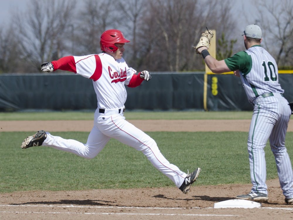 Freshman outfielder Alex Call runs to first base during the game against Eastern Michigan on April 5 at  Ball Diamond. DN PHOTO BREANNA DAUGHERTY 
