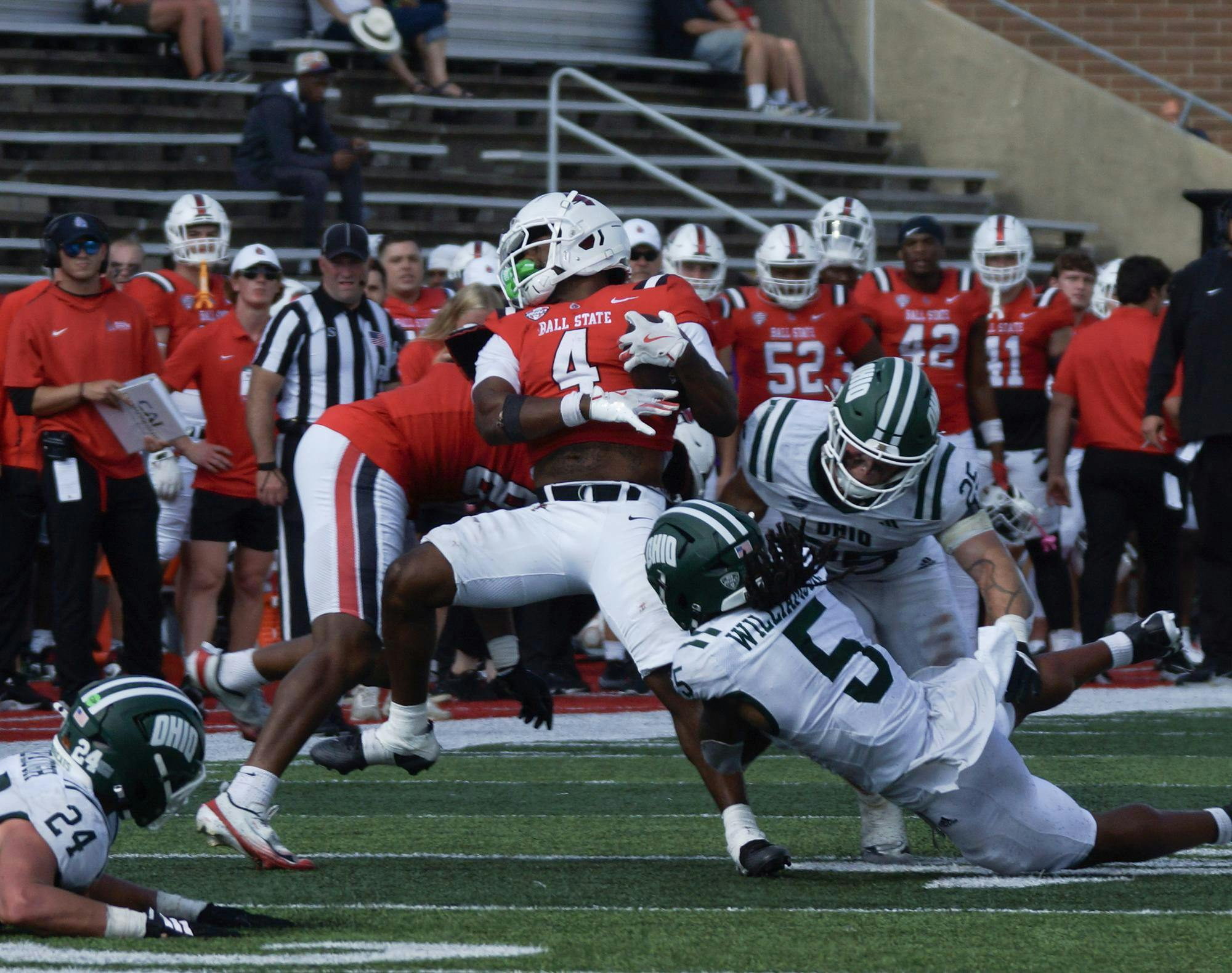Redshirt sophomore and running back TJ Horton avoids a tackle during Ball State vs Ohio football Oct. 4 at Scheumann Stadium. Horton has rushed for 74 yards this season, Kyle Ingermann DN