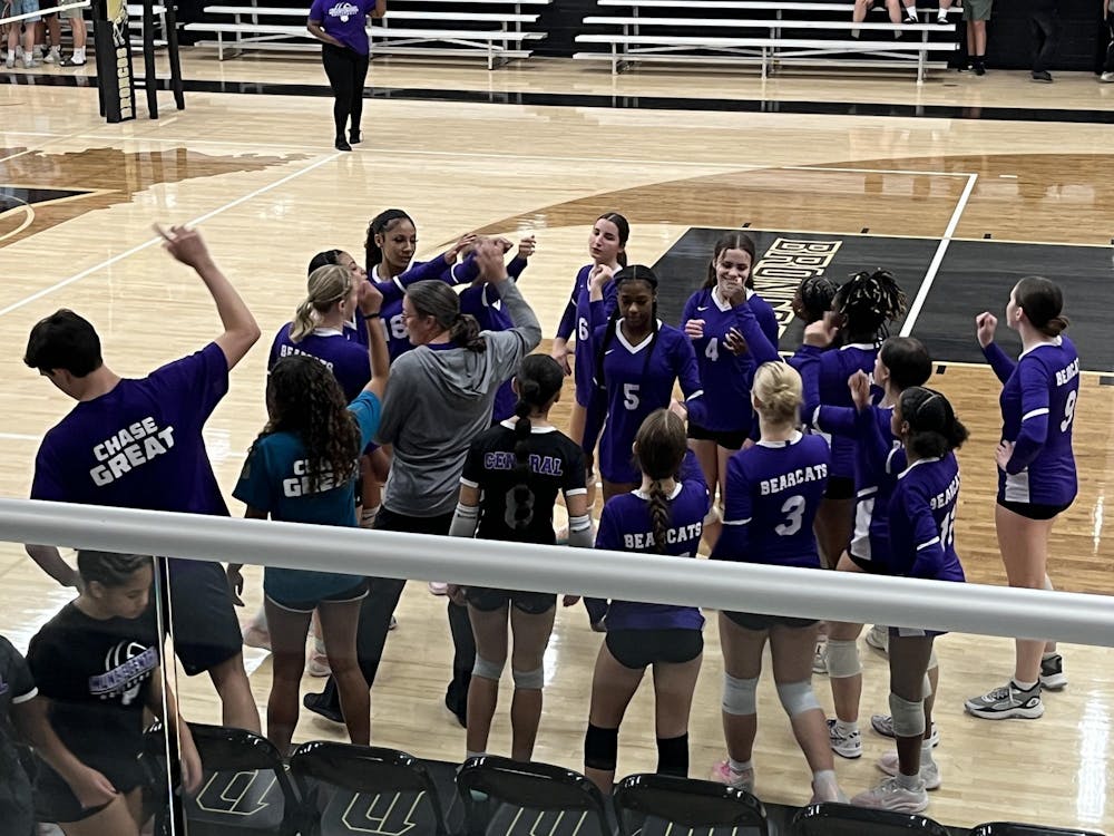 The team huddles up as a team before the match with the Daleville Lady Broncos. The team would go on to score 57 kills across five sets. PHOTO BY EVAN SHOTTS.