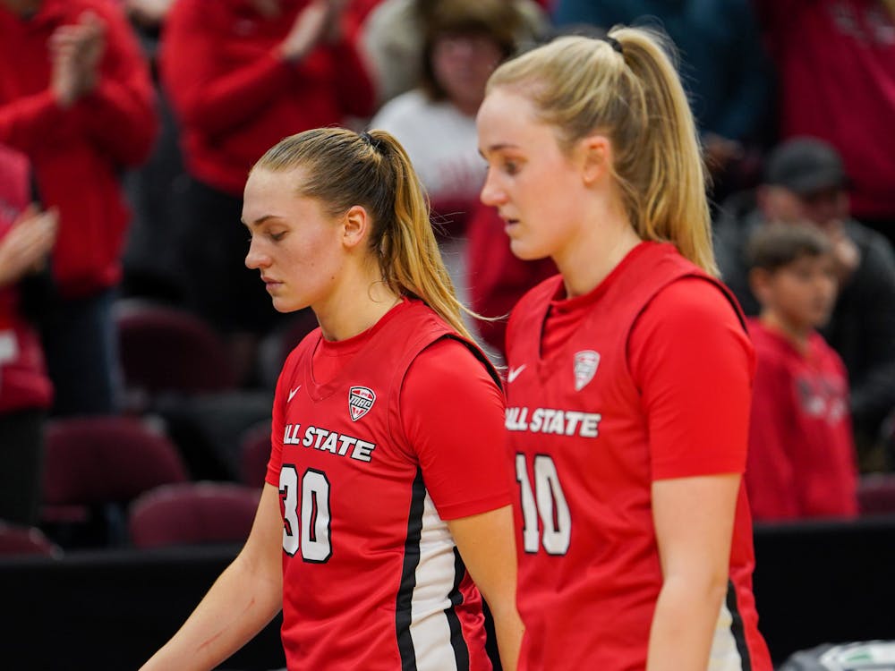 Graduate student Thelma Dis Agustsdottir (right) and redshirt-senior Anna Clephane (left) walk off the court after a loss against Bowling Green in the MAC Tournament Semifinals March 10 at Rocket Mortgage Fieldhouse in Cleveland. Dis Agustsdottir and Clephane combined for 30 of the Cardinals 61 points. Brayden Goins, DN