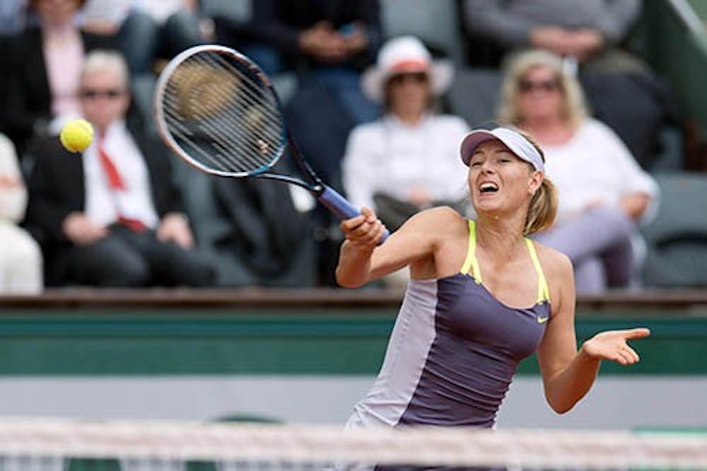 Russia’s Maria Sharapova hits a shot during the French Tennis Open 2013 in Paris, France, on Saturday. Sharapova defeated her opponent Zheng Jie, 6-1 and 7-5. MCT PHOTO